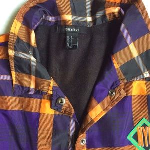 Short jacket with gold and blue stripes